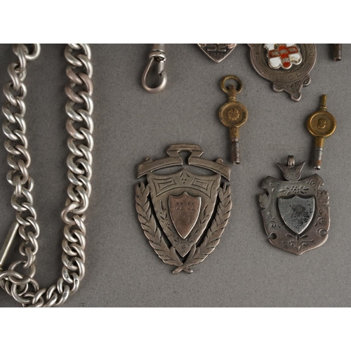 106 - A 925 sterling silver Albert chain together with five early 20th Century fob medals, all marked, gro... 