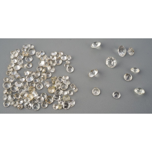 289 - A collection of colourless sapphire, synthetixc spinel and colouless paste and other colourless ston... 