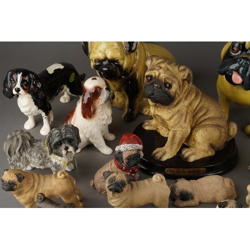 A box of ceramics containing a collection of assorted figures of dogs ...