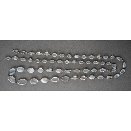 A long moonstone necklace. Designed as a series of graduating moonstone ...