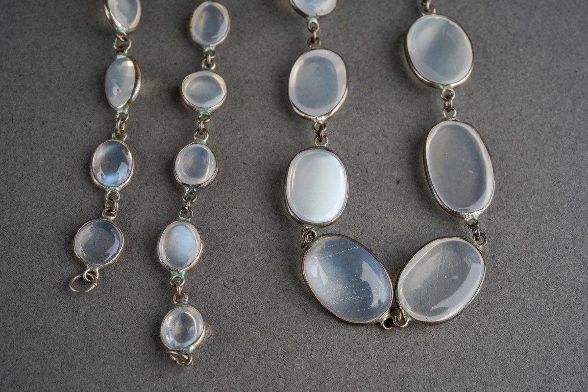 A long moonstone necklace. Designed as a series of graduating moonstone ...