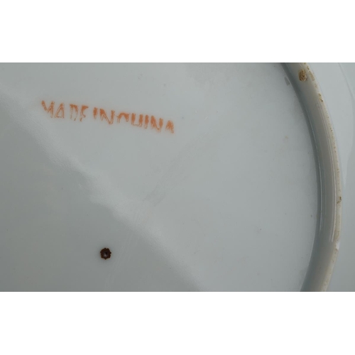 122 - A set of twelve Chinese dinner plates and matching oval platter, each decorated with carp and shrimp... 