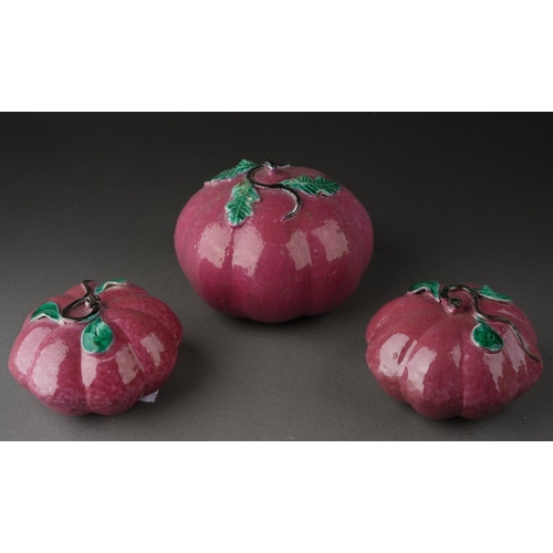 125 - Three Chinese ceramic Altar fruits comprising three various purple pumpkins [3]
