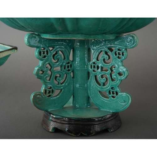 128 - A matched garniture of Chinese turquoise glazed dishes on stands, shaped octagonal moulded dishes ov... 
