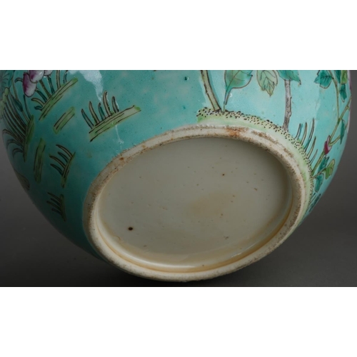 129 - A pair of 20th Century Chinese large globular ginger jars and covers, decorated in the Famille Rose ... 