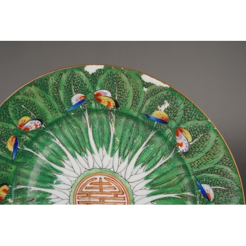 134 - A 20th century Chinese export porcelain part dinner service, comprising ten soup plates and eight de... 