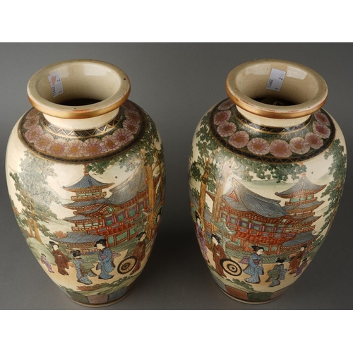 136 - A pair of Satsuma vases decorated with Geisha with pagoda and mountains behind, character mark to ba... 