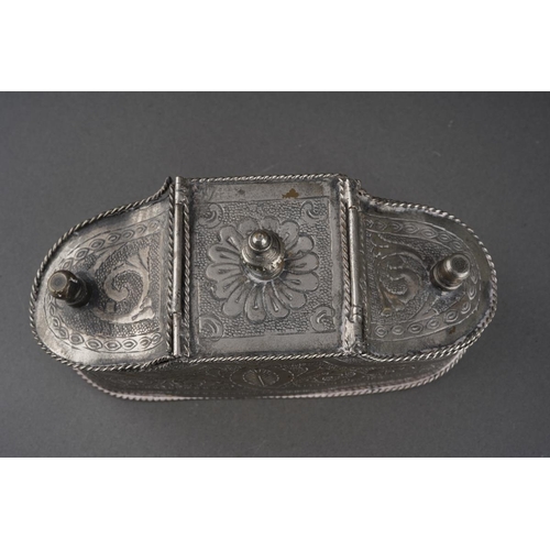 201 - An Asian possibly Cambodian engraved white metal [low grade untested] betel nut box, with ropetwist ... 