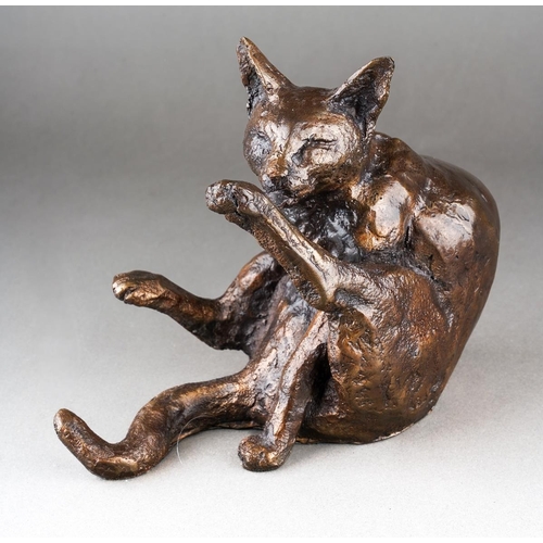 205 - A Paul Jenkins bronze of a seated cat licking its paw, probably a Frith Sculpture, signed with initi... 