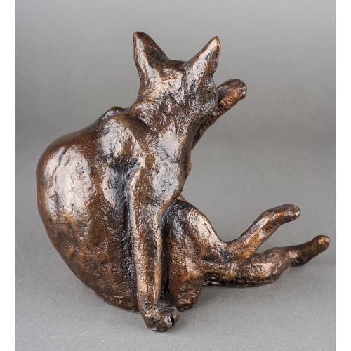 205 - A Paul Jenkins bronze of a seated cat licking its paw, probably a Frith Sculpture, signed with initi... 