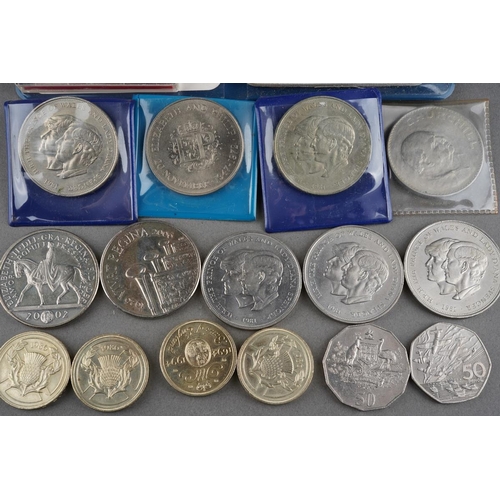 323 - A collection of coins to include Britain's first decimal coin set, crowns, Churchill, commemorative ... 