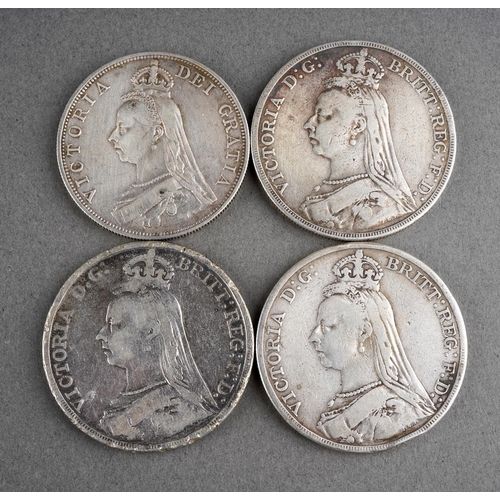 329 - A collection of coins to include an 1887 Double Florin and three Victoria Crowns