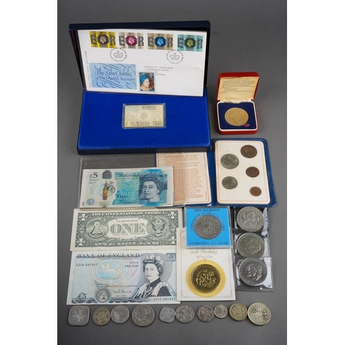 332 - A collection of coins to include a 1977 silver jubilee 1D silver stamp ingot set, a 1981 Royal Weddi... 