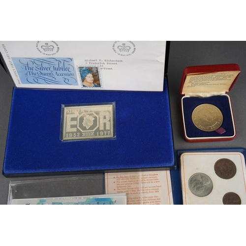 332 - A collection of coins to include a 1977 silver jubilee 1D silver stamp ingot set, a 1981 Royal Weddi... 