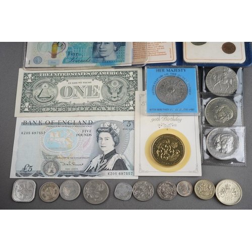 332 - A collection of coins to include a 1977 silver jubilee 1D silver stamp ingot set, a 1981 Royal Weddi... 