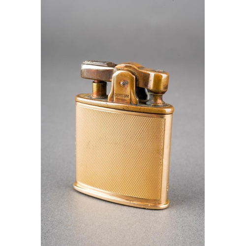 A vintage Ronson Dureum 9ct gold cased engine turned with central ...