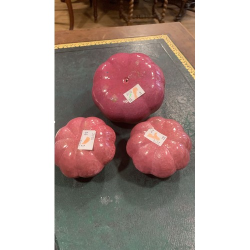 125 - Three Chinese ceramic Altar fruits comprising three various purple pumpkins [3]