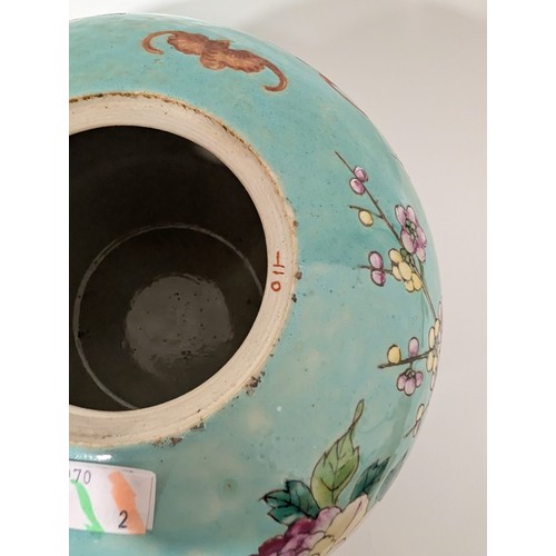 129 - A pair of 20th Century Chinese large globular ginger jars and covers, decorated in the Famille Rose ... 