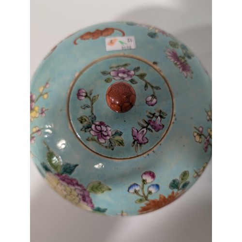 129 - A pair of 20th Century Chinese large globular ginger jars and covers, decorated in the Famille Rose ... 