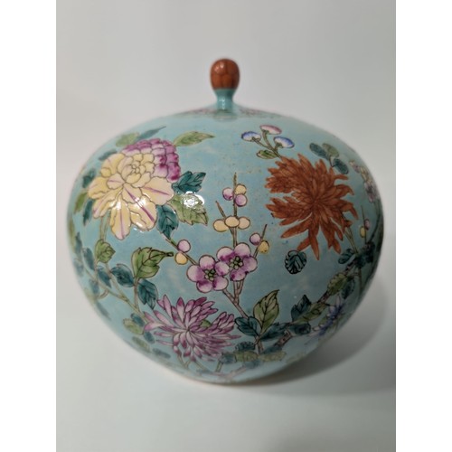 129 - A pair of 20th Century Chinese large globular ginger jars and covers, decorated in the Famille Rose ... 