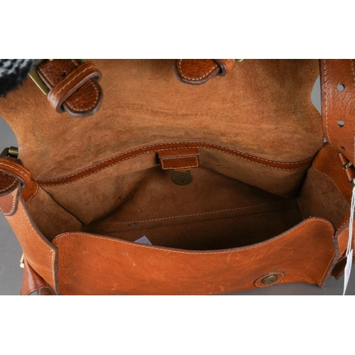 21 - A Mulberry Brooke satchel style shoulder bag in tan leather, fold over top flap with decorative buck... 