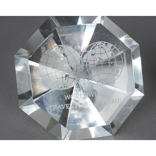 44 - Four pieces of Tiffany & Co glassware, comprising a star shaped paperweight, two flattened points to... 