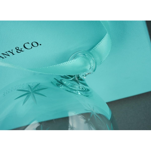 48 - A boxed Tiffany & Co Slovenian glass Christmas tree bauble with etched star decoration, strung on a ... 
