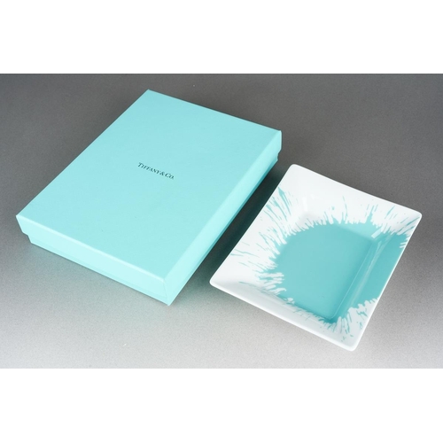 51 - A boxed Tiffany & Co Portuguese porcelain rectangular dish with printed splash design, numbered 3446... 