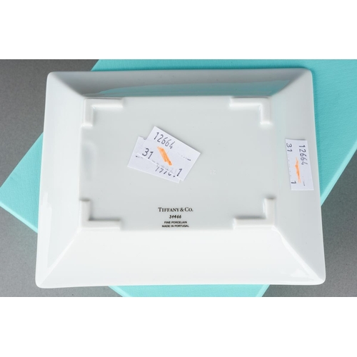 51 - A boxed Tiffany & Co Portuguese porcelain rectangular dish with printed splash design, numbered 3446... 