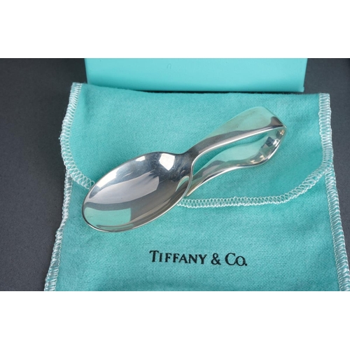 59 - Two Tiffany & Co silver spoons, comprising a boxed baby's feeding spoon, stamped 