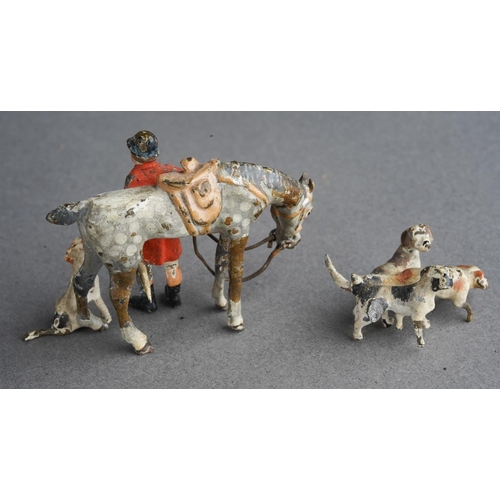 434 - Two led fox hunting models, one of dappled grey horse, huntsman and hound and other of 3 hounds, tal... 