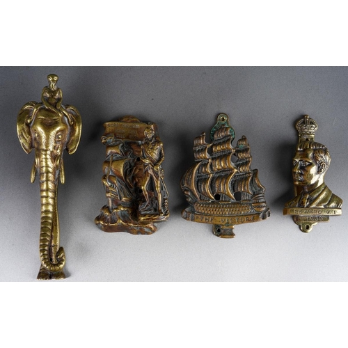 452 - A collection of 3 brass doorknockers to include The Victory ship, Lord Nelson and Edward VIII togeth... 