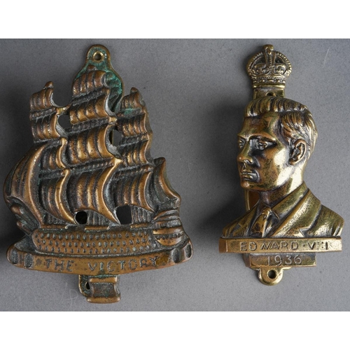 452 - A collection of 3 brass doorknockers to include The Victory ship, Lord Nelson and Edward VIII togeth... 