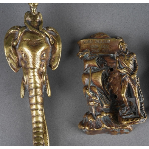 452 - A collection of 3 brass doorknockers to include The Victory ship, Lord Nelson and Edward VIII togeth... 