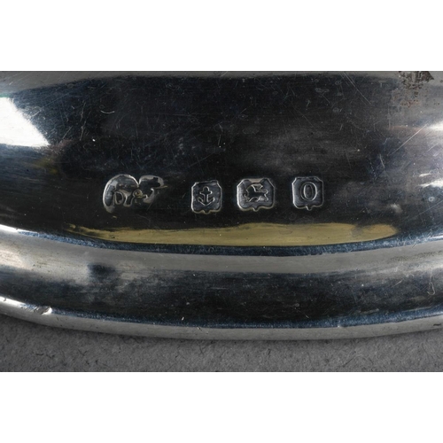 458 - A George V silver perpetual calendar of rectangular form on an oval loaded base, fitted with removab... 