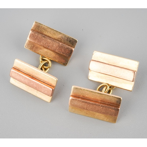 474 - A pair of Art Deco rose and yellow gold cufflinks. Stamped 9ct to reverse of each cufflink face, app... 