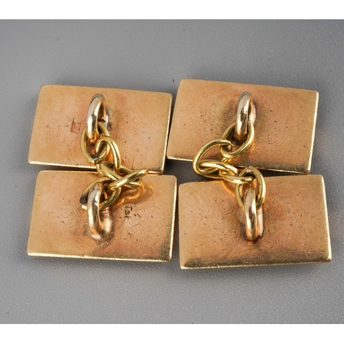 474 - A pair of Art Deco rose and yellow gold cufflinks. Stamped 9ct to reverse of each cufflink face, app... 