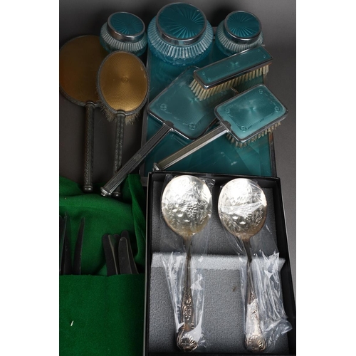 494 - A modern Viners Gerald Benney part canteen of stainless steel cutlery, boxed silver plated serving s... 