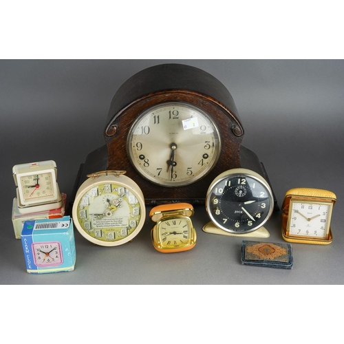 498 - Assorted clocks to include: a 1950s Smith Alarm Hare and Tortoise alarm clock with verse and picture... 