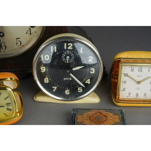 498 - Assorted clocks to include: a 1950s Smith Alarm Hare and Tortoise alarm clock with verse and picture... 