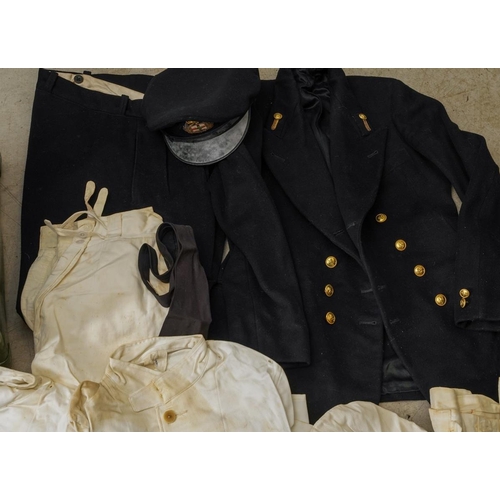 500 - A vintage metal suitcase containing Merchant Navy uniforms, heavy and light weight (Winter / Summer)... 