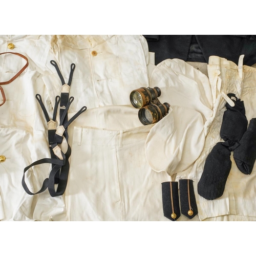 500 - A vintage metal suitcase containing Merchant Navy uniforms, heavy and light weight (Winter / Summer)... 