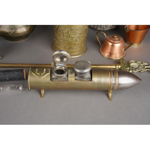 506 - A box of trench art and metalware, etc,  including a bullet desk stand fitted with two inkwells, ass... 