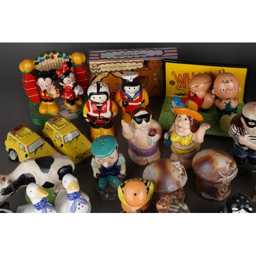 521 - A collection of novelty salt and peppers, various factories, designs include Cows, Cats, Geese, Chic... 