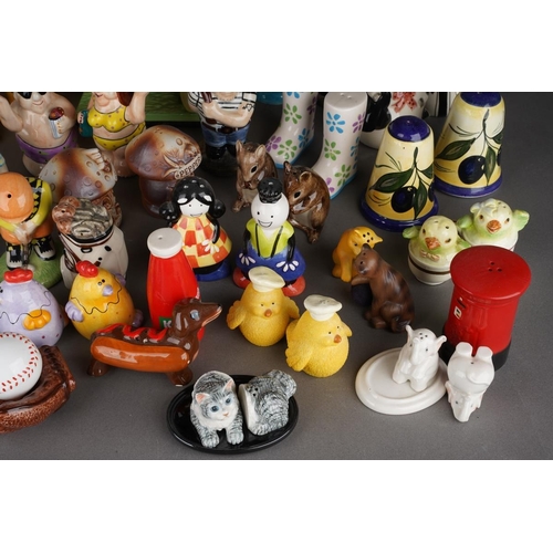 521 - A collection of novelty salt and peppers, various factories, designs include Cows, Cats, Geese, Chic... 