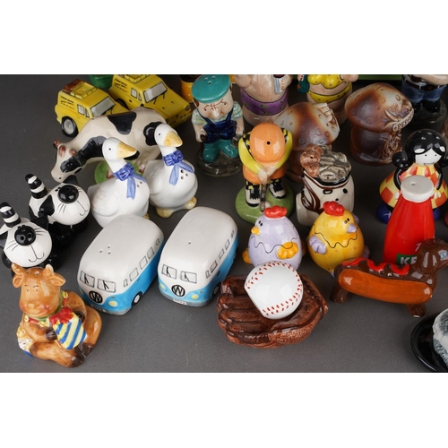 521 - A collection of novelty salt and peppers, various factories, designs include Cows, Cats, Geese, Chic... 