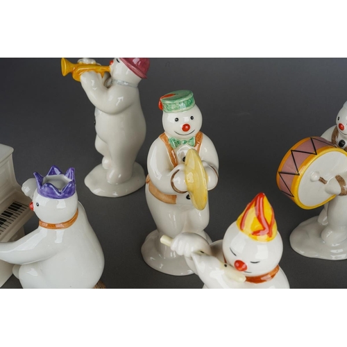524 - Eight Royal Doulton Snowman band figures from The Snowman Gift Collection including Pianist, Drummer... 