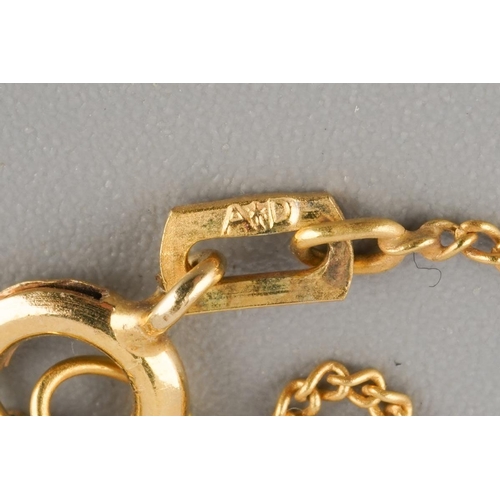 536 - A chain and pair of cultured pearl earrings. To include a flat curb link chain, together with a pair... 