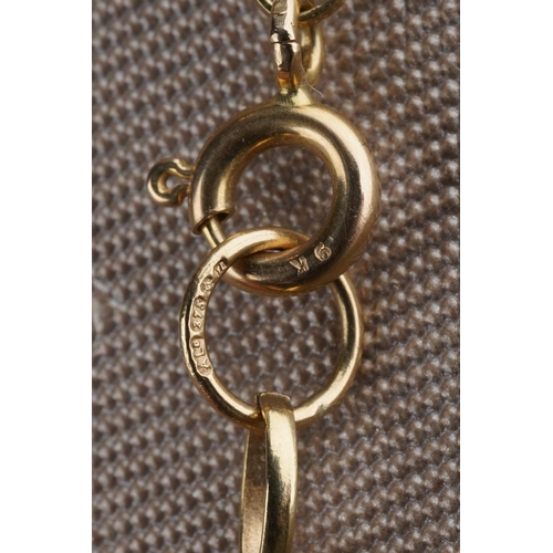 540 - A 9ct gold necklace. Designed as a 9ct yellow gold chain, 9ct gold import marks for London, approx l... 