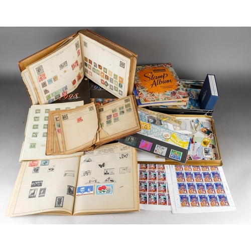 697 - A collection of various stamps to include some in albums and some loose to include sheets of Isle of... 